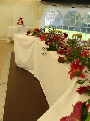 Wire, calla, gerbera and lily top table decoration